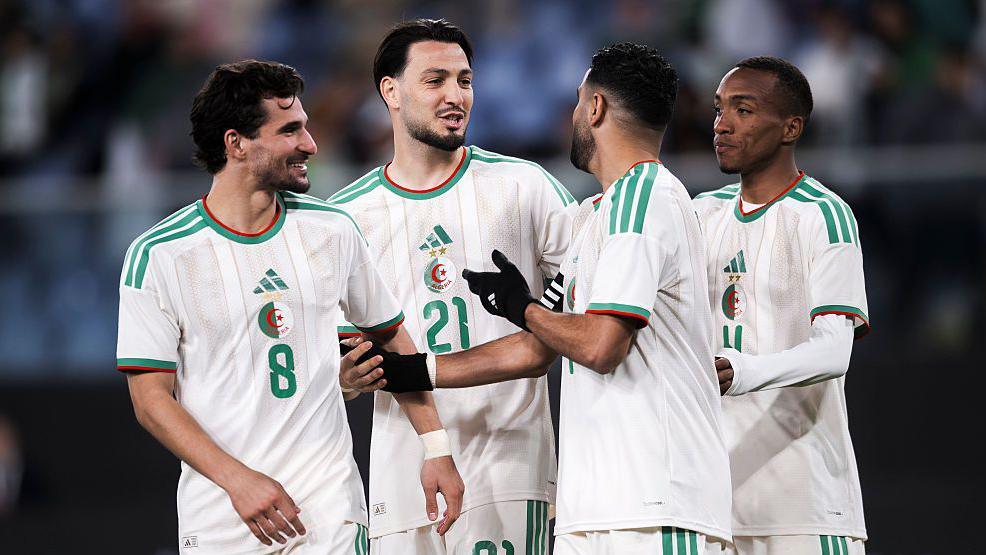 Houssem Aouar, Ramy Bensebaini, Riyad Mahrez and Achref Abada of Algeria celebrate during the friendly football match between Algeria and Guatemala