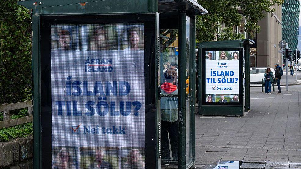 This image taken on August 25, 2026 shows a campaign advertisement reading "Iceland for sale? No thanks" 