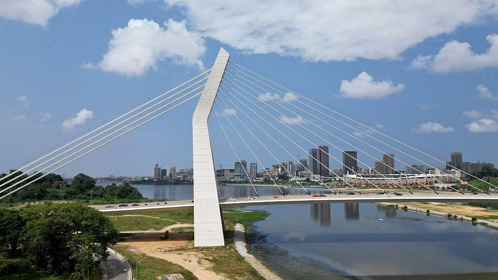 An aerial view of Alassane Ouattara bridge in plateau, the business district of Abidjan on July 25, 2025.