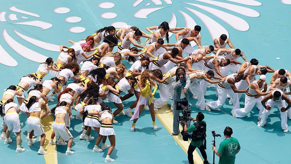 Colombian singer, songwriter and producer Shakira and Nigerian singer, songwriter, and record producer Burna Boy perform during the opening ceremony ahead of the 2026 World Cup Group A football match between Mexico and South Africa at the Mexico City Stadium in Mexico City on June 11, 2026.