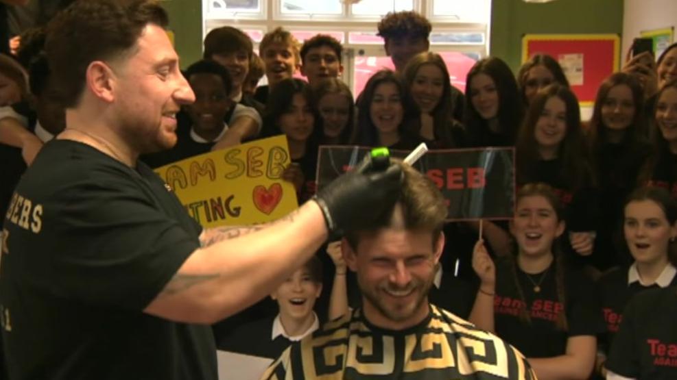 Teacher getting hair cut