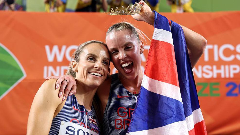 Keely Hodgkinson and Georgia Hunter Bell celebrate after winning gold medals at the World Indoor Athletics Championships in 2026