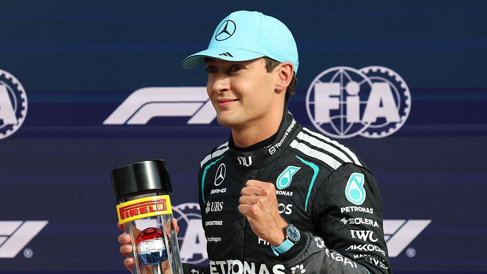 George Russell celebrates taking sprint pole in Zandvoort