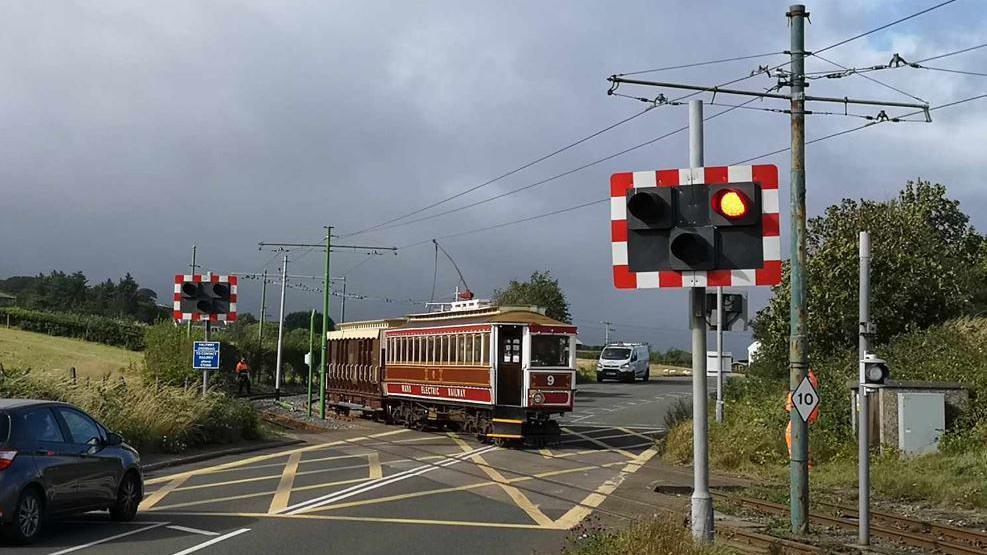  A tram using the crossing that needs repairs