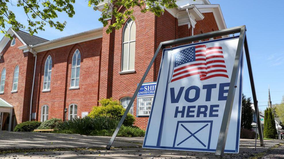 A "vote here" sign is seen outside of the Shiloh United Church of Christ which served as a polling station in Pennsylvania's primary election on Tuesday, April 23, 2024.