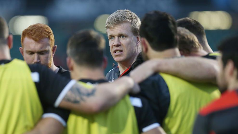 Don Barrell in the midst of a Saracens huddle