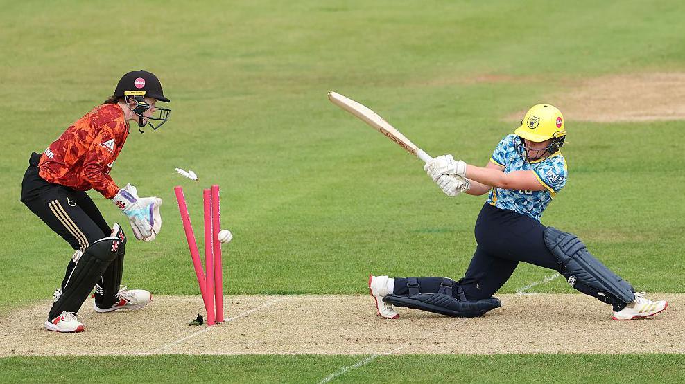 Charis Pavely is bowled after top scoring for Warwickshire Bears