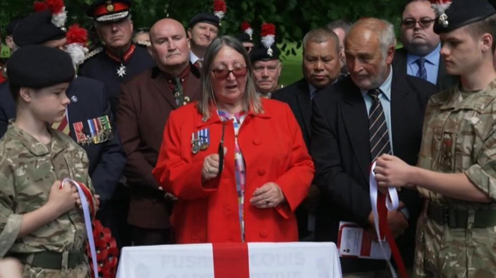 Denise Carter unveiling road sign