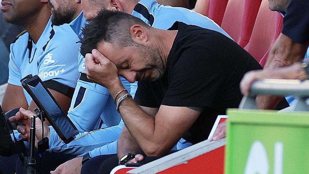 Spurs coach Roberto De Zerbi in despair as his new-look side slump to a heavy defeat at Brentford on the opening day of the Premier League season.