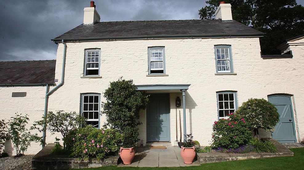 The three-bedroom property is a former coach house