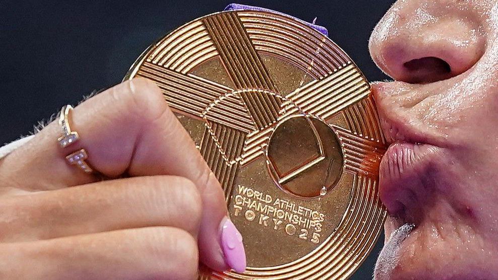 A close-up image of the World Championships gold medal 