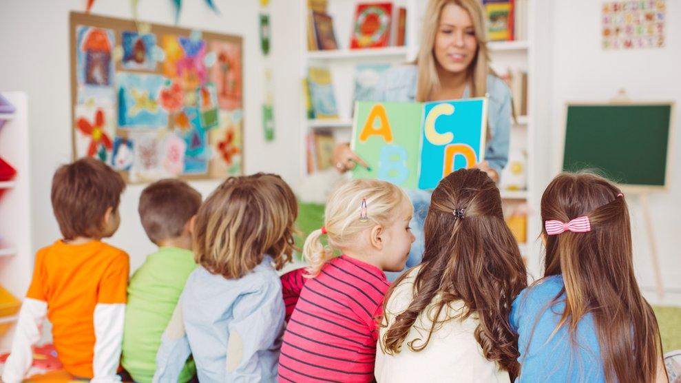 Young children learn the alphabet in a nursery school