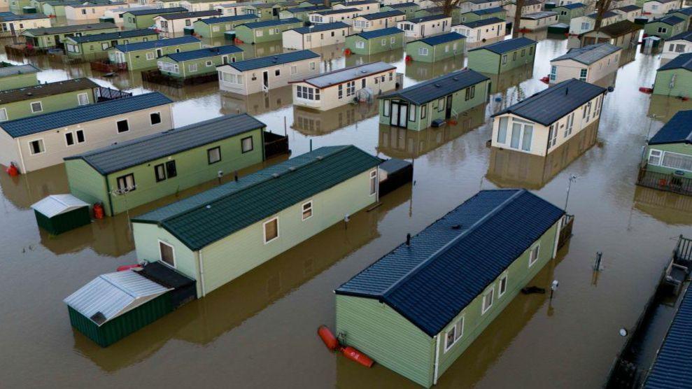 Flooded caravans at Billing Aquadrome Holiday Park near Northampton, where Storm Bert caused water levels to rise