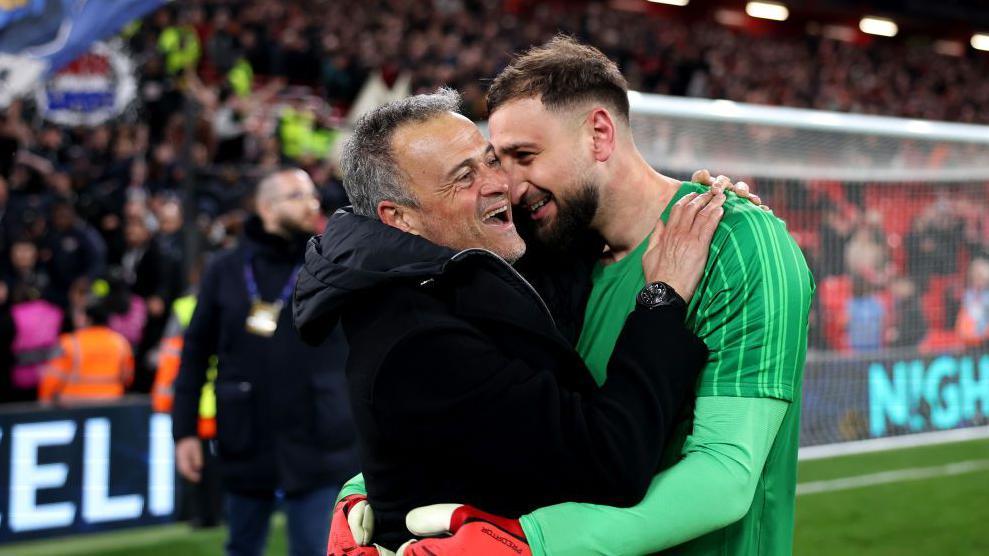 Gianluigi Donnarumma and Luis Enrique embracing