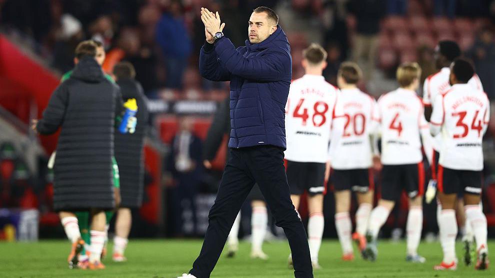 Tonda Eckert claps the Southampton fans