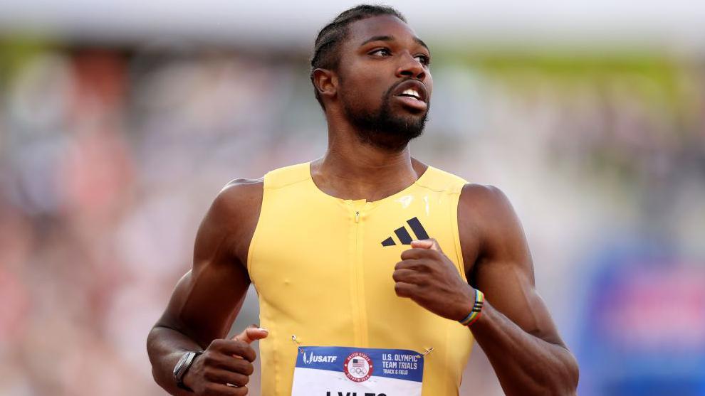 Noah Lyles mid run on the track.