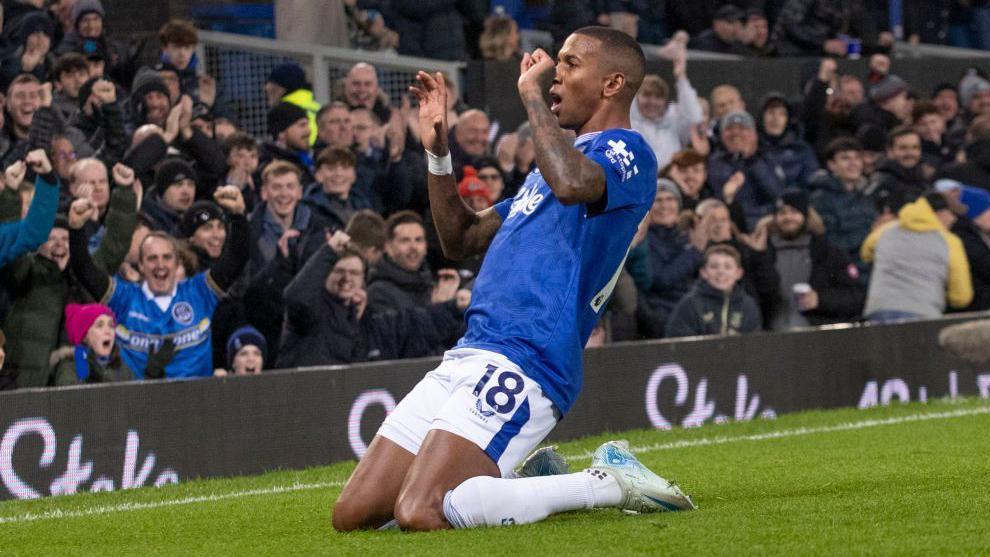 Ashley Young celebrates scoring