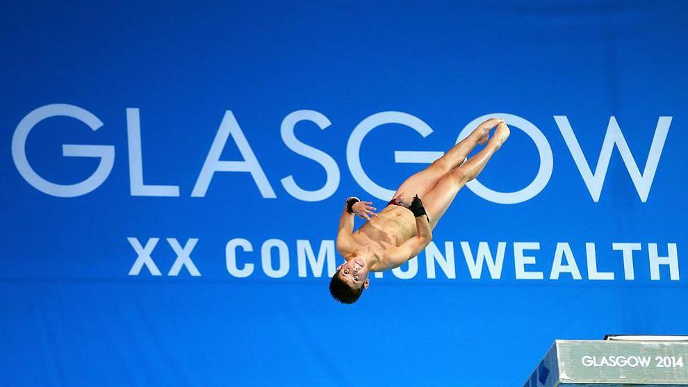 Tom Daley mid dive at the Commonwealth Games 2014