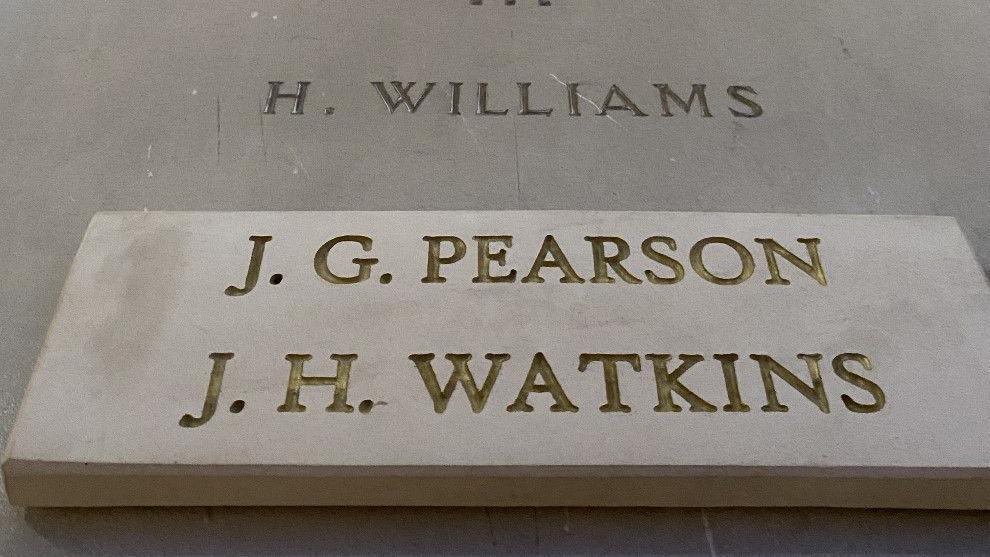 The memorial now naming the two former students, JG Pearson and JH Watkins, with their names on a new raised piece rather than on the previously-constructed memorial.
