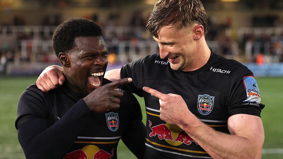 Christian Wade celebrates with Newcastle's hat-trick hero Alex Hearle