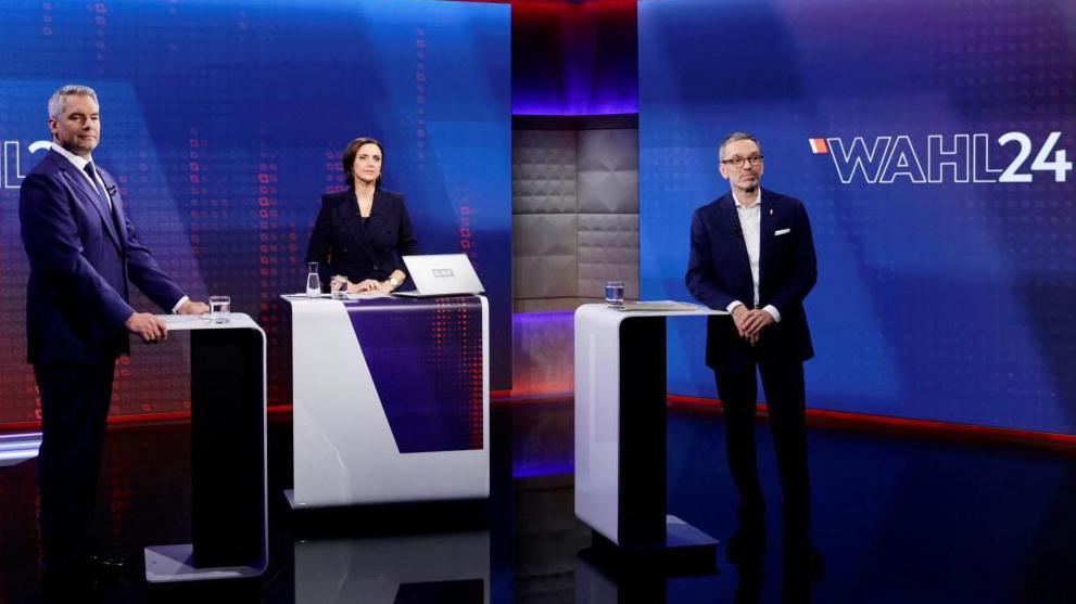 Chancellor and head of People's Party (OeVP) Karl Nehammer and head of Freedom Party (FPOe) Herbert Kickl wait for the start of a TV discussion in Vienna, Austria, September 23, 2024