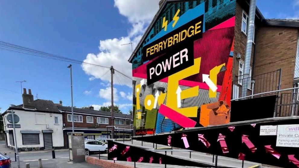 Another view of an artist's impression of how the mural would look. It is a bright pink, blue and yellow design with graphic lightning bolts and text which reads 'Ferrybridge Power'.