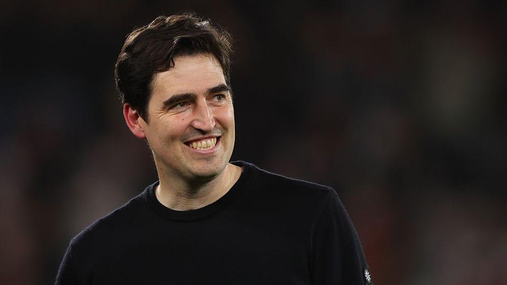 Andoni Iraola smiles after the Premier League match between Bournemouth and Manchester City