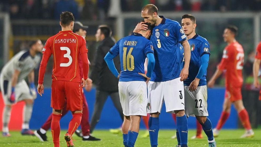 Chiellini consoles Florenzi after Italy's 1-0 defeat to North Macedonia in March 2022