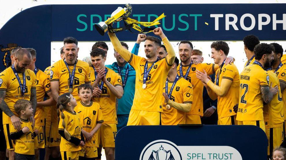 Livingston observe  their SPFL Trust Trophy success