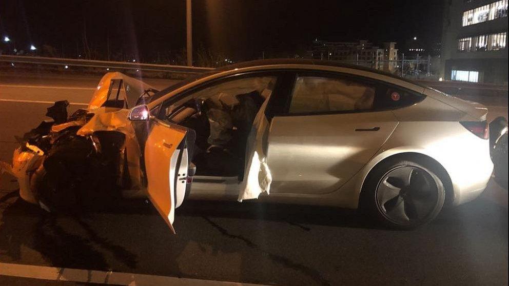 A Tesla Model 3 that crashed into a police car.