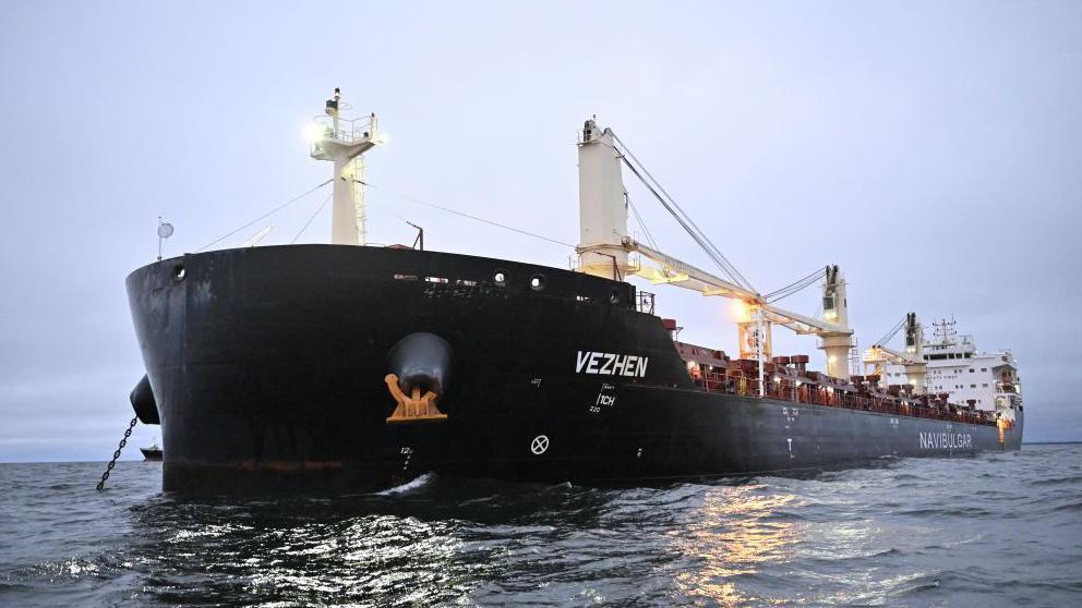 A cargo ship bearing the name Vezhen at sea 