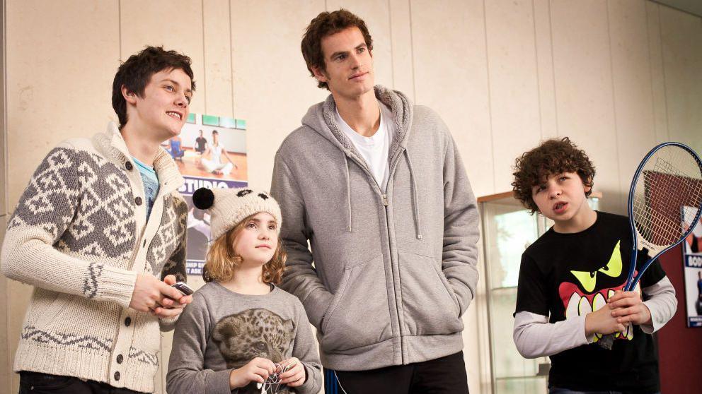 Right to left: Tyger Drew-Honey, Ramona Marquez, Andy Murray and Daniel Roche in a sports hall