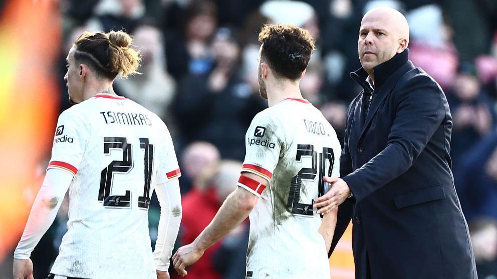 Disappointed Liverpool head coach Arne Slot with Kostas Tsimikas and Diogo Jota after the embarrassing FA Cup defeat at Plymouth