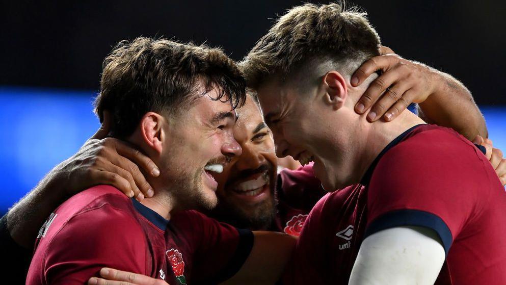 Ollie Lawrence makes sure George Furbank and Tommy Freeman embrace after the try