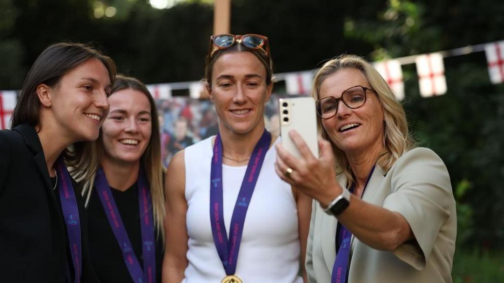 (L-R) England's Lotte Wubben-Moy, Lauren Hemp, Lucy Bronze and manager Sarina Wiegman participate in a video call with Prime Minister Sir Keir Starmer  in the garden at 10 Downing Street in London, Britain, 28 July 2025