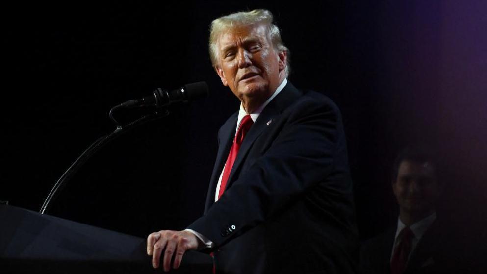 Republican presidential nominee and former U.S. President Donald Trump takes the stage following early results from the 2024 U.S. presidential election in Palm Beach County Convention Center, in West Palm Beach, Florida, U.S., November 6, 2024.