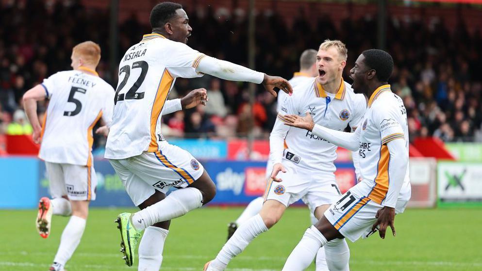 Aristote Nsiala celebrates his goal against Crawley in Shrewsbury's 5-3 win in League One