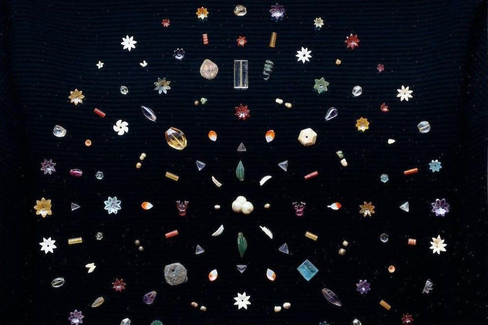 The jewels comprise nearly 1,800 pearls, rubies, topaz, sapphires, and patterned gold sheets