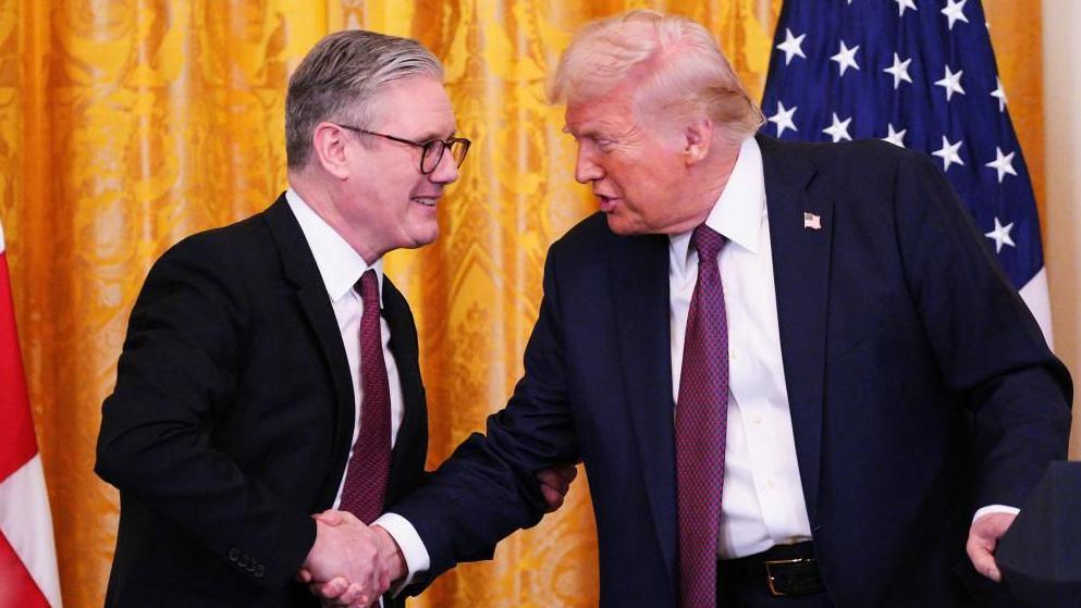 British Prime Minister Sir Keir Starmer and US President Donald Trump shake hands during a joint press conference in the East Room at the White House, 27 February 2025