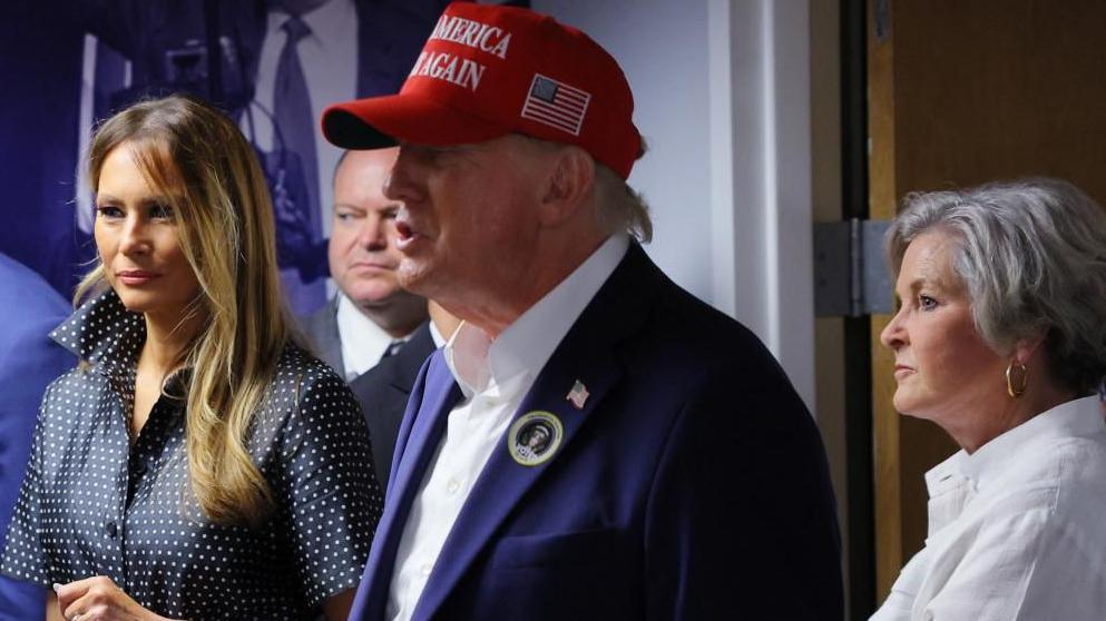 Senior advisor Susie Wiles listens as Republican presidential nominee former U.S. President Donald Trump, accompanied by his wife Melania, thanks campaign workers at his campaign headquarters on Election Day, in West Palm Beach, Florida, U.S., November 5, 2024.