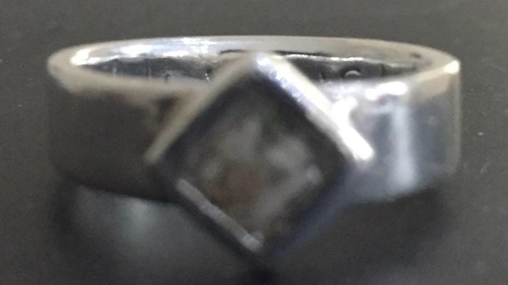 A silver ring containing Donna Dixon's son's ashes