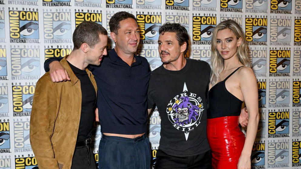 The Fantastic Four cast smiling at Comic-Con -  Joseph Quinn, Ebon Moss-Bachrach, Pedro Pascal and Vanessa Kirby