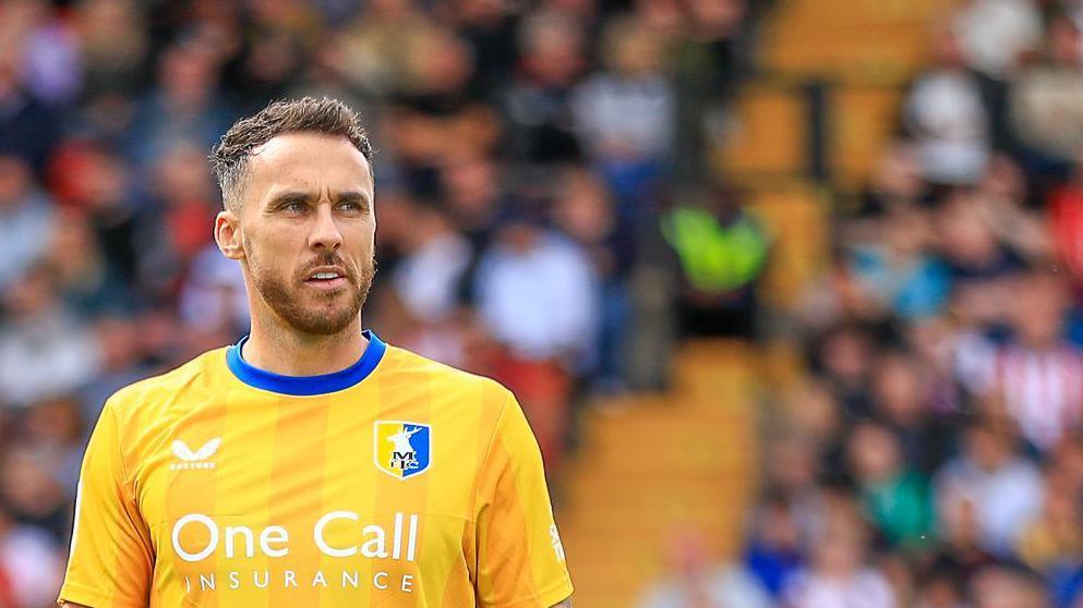 Lee Gregory in action for Mansfield Town