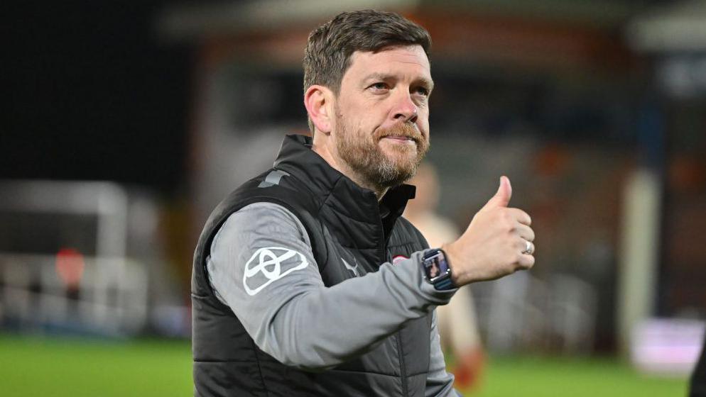 Darrell Clarke giving a thumbs-up