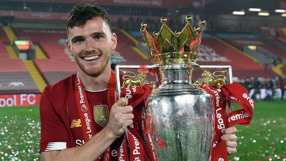 Andy Robertson of Liverpool with the Premier League Trophy match between Liverpool FC and Chelsea FC at Anfield on 22 July, 2020 in Liverpool, England