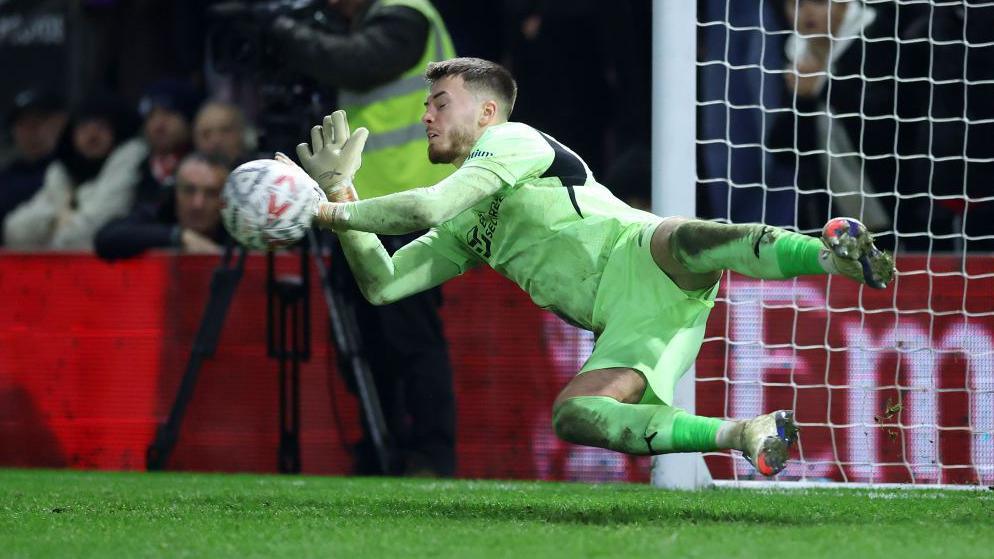 Josh Keeley saves a penalty for Leyton Orient