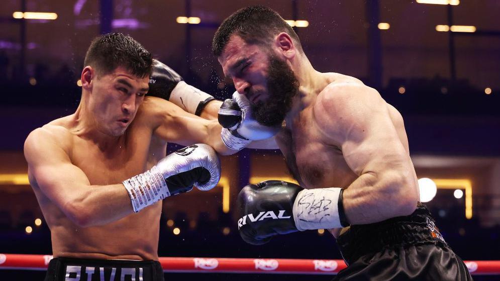 Dmitry Bivol punches Artur Beterbiev