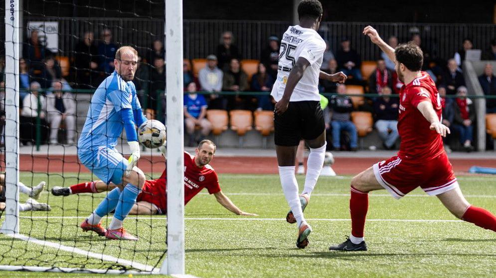 Edinburgh City's Divine Iserhienrhien scores