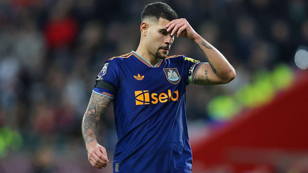 Bruno Guimaraes looks dejected playing for Newcastle