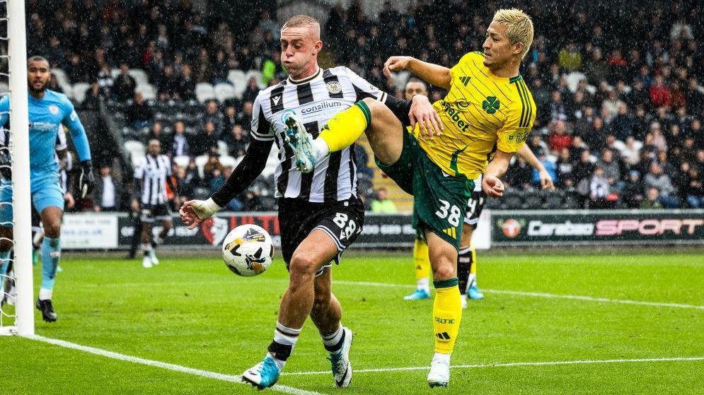 St Mirren's Killian Phillips and Celtic's Daizen Maeda